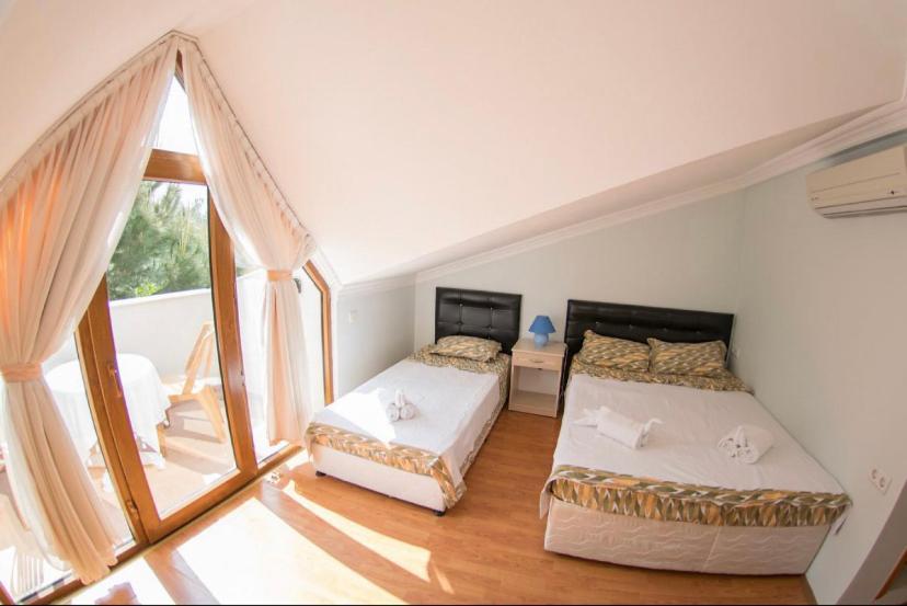 Boncuklu Otel โอลลุนเดนิซ ภายนอก รูปภาพ